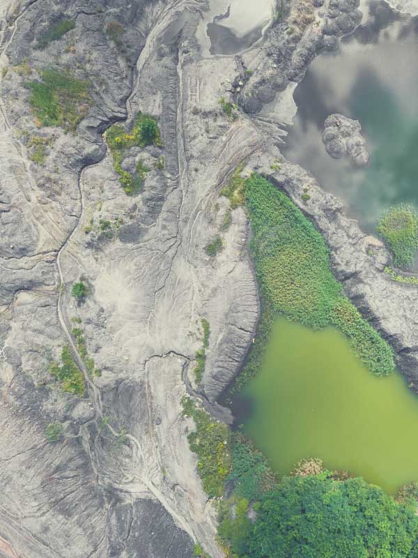 aerial topographical view of grasslands and rock formations